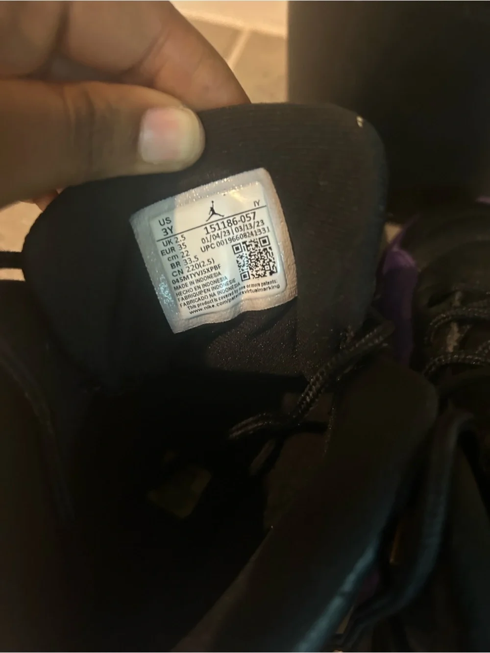 Jordan Black and Purple High-Top Sneakers
